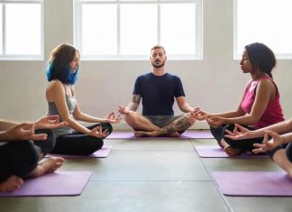 Practicing group yoga is good for body and soul